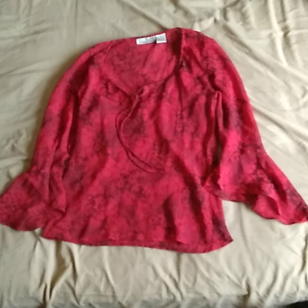 Red bell sleeved top